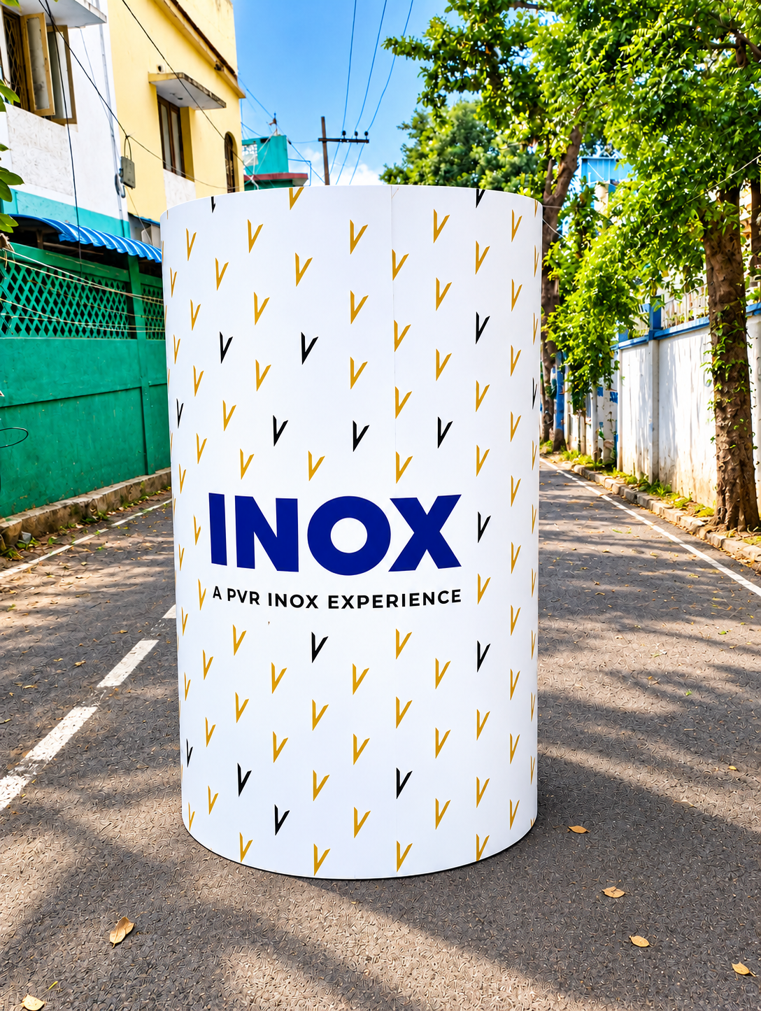 INOX Display on a Sunlit Street